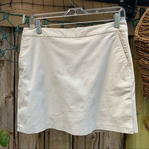 Adidas Clima stretch golf skorts, Size 8.  Color: cream, 2 pockets, back zipper